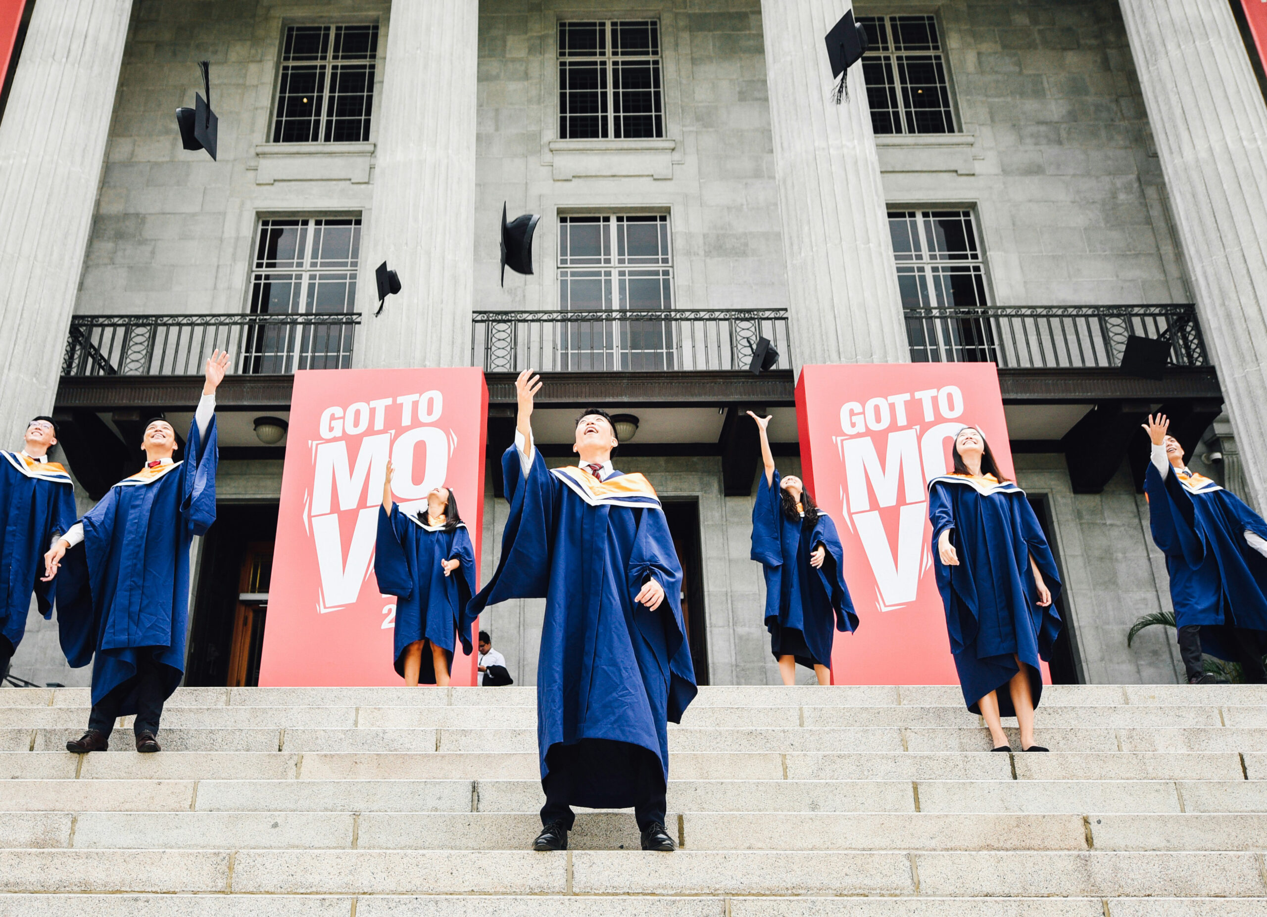 Graduates walking at graduation ceremony