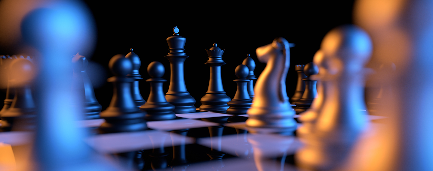 Colorful chess pieces representing strategic thinking
